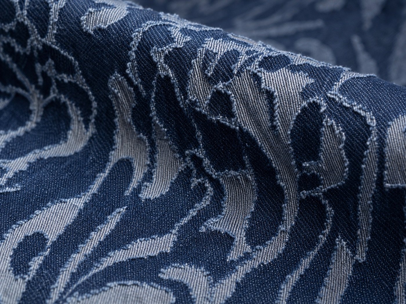 Denim burnout fabric macro with controlled transparent etched patterns