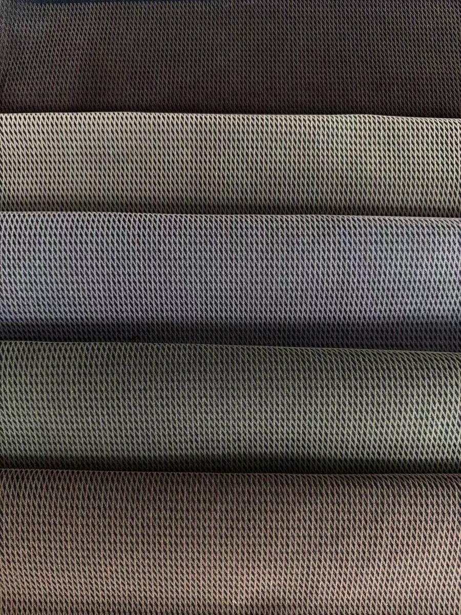 Diamond flocked denim surface for checking pattern consistency