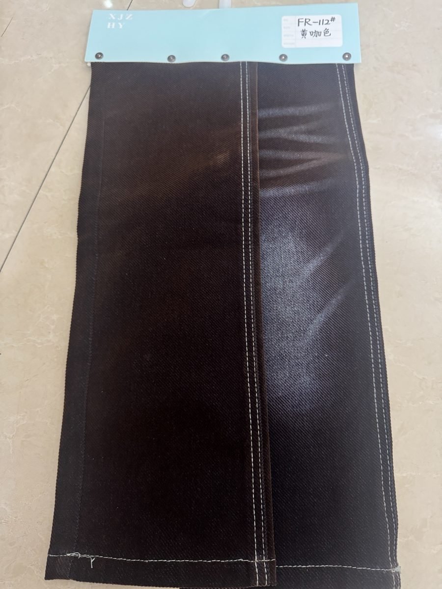 Flocked denim sample showing seam and folding zones for bulk testing